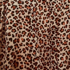 Pink leopard dress. Sleeveless, ruffled
